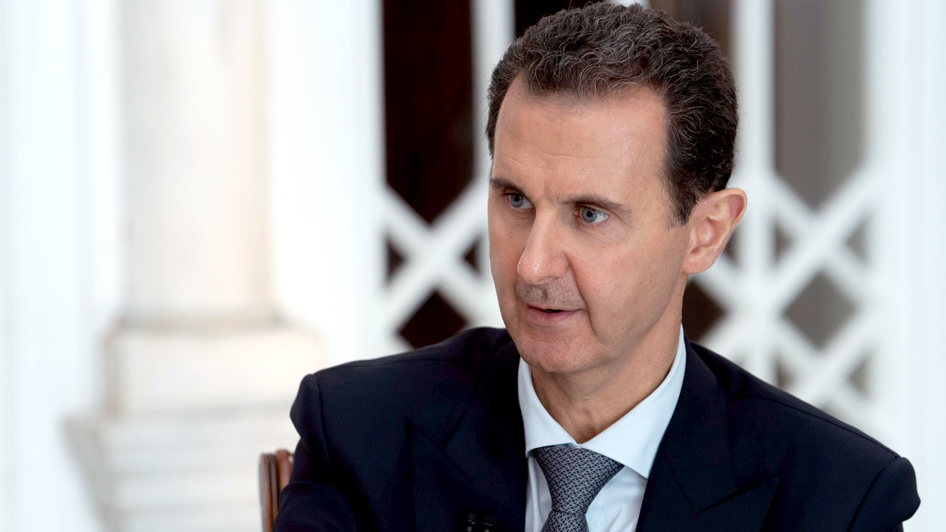 Syriens Präsident Assad spricht beim einem Fernsehinterview | Bildquelle: AFP