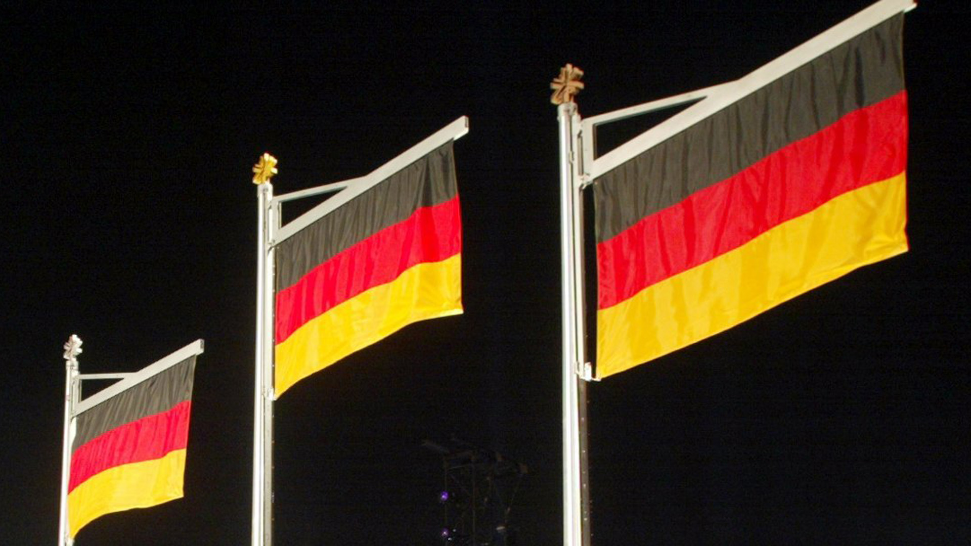 Deutsche Flaggen bei einer olympischen Siegerehrung | Bildquelle: picture-alliance / dpa/dpaweb
