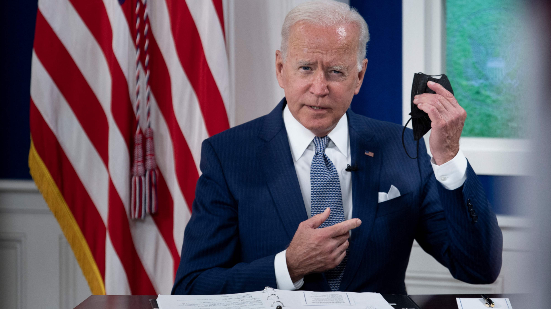 US-Präsident Biden auf einem virtuellem Gipfel zur Corona-Krise. | AFP