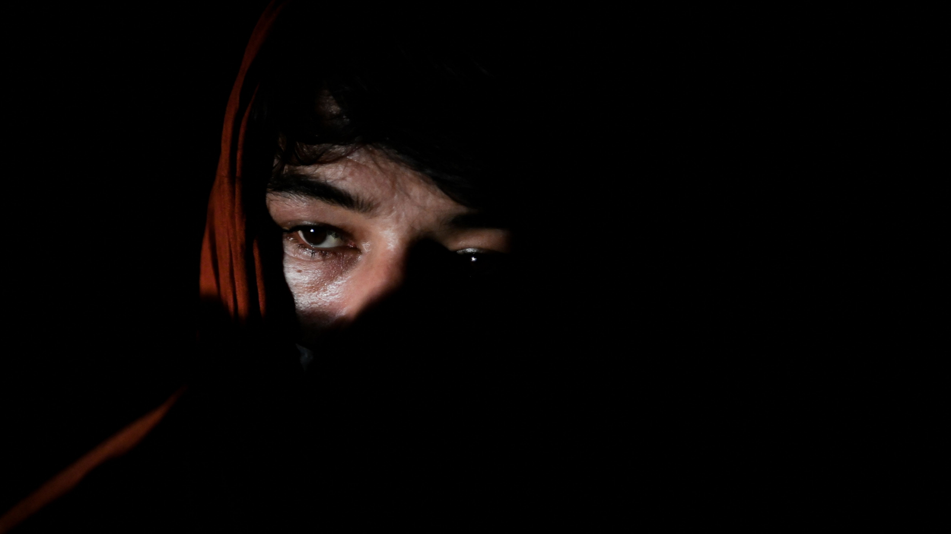 Eine afghanische Frau auf der Flucht | AFP
