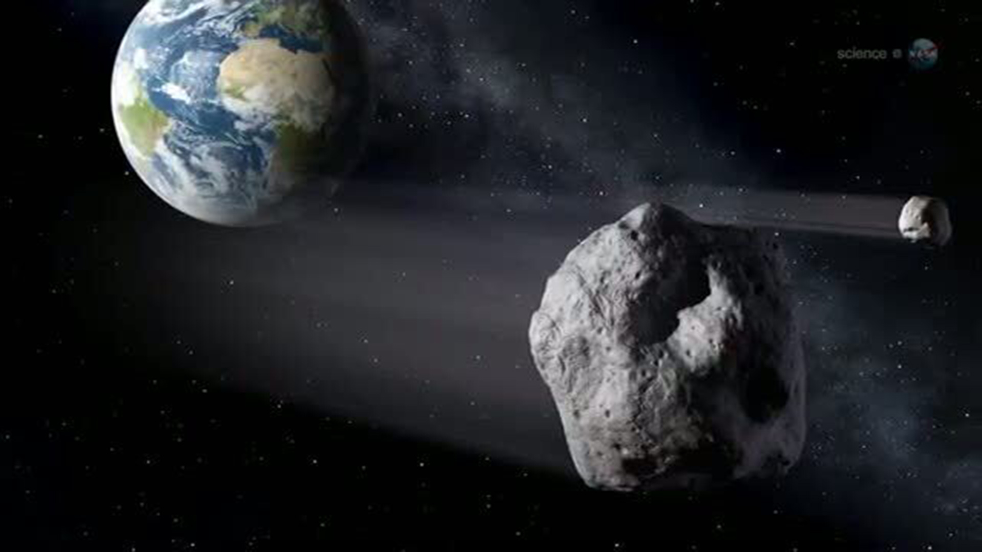 Asteroid fliegt an der Erde vorbei (Illustration) | picture alliance / dpa