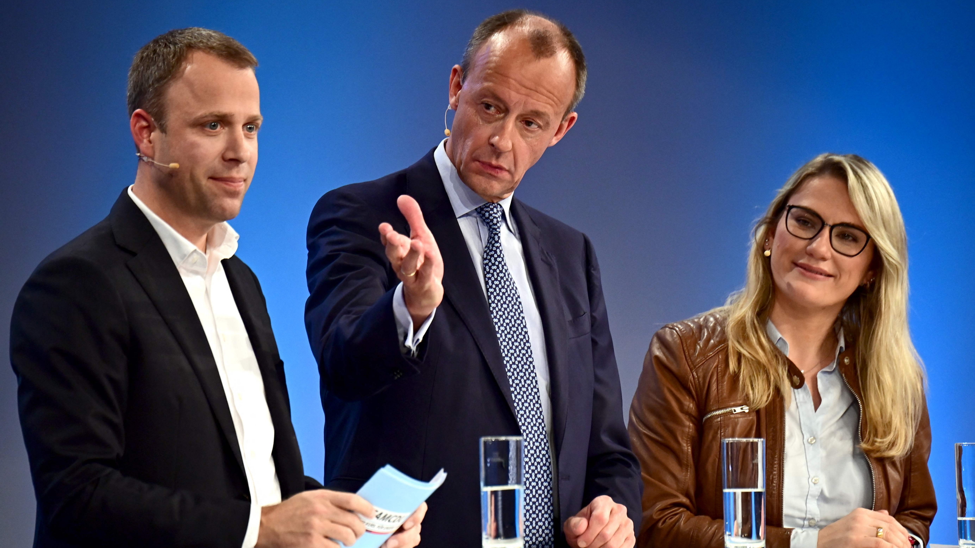 Mario Czaja, Friedrich Merz und Christina Stumpp | AFP