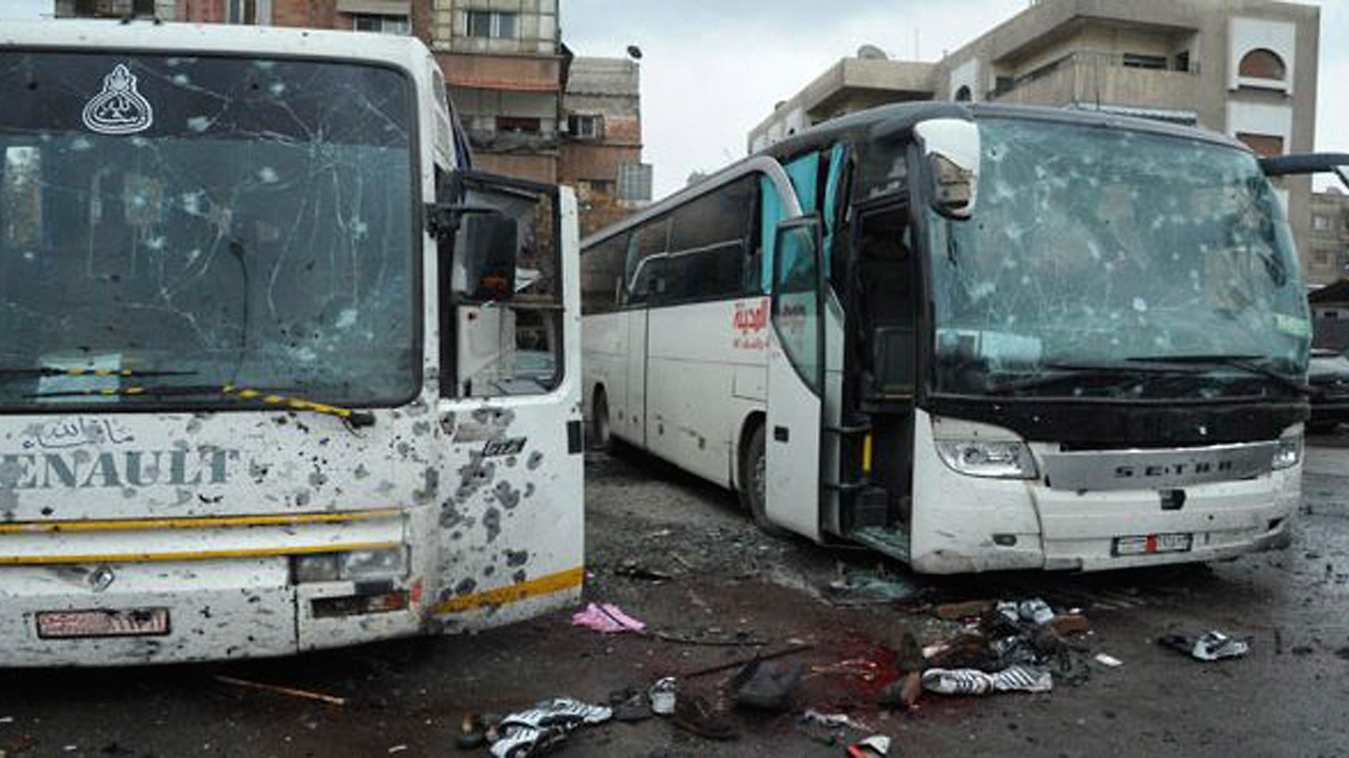 Zerstörte Busse nach einem Bombenanschlag in Damaskus | AP