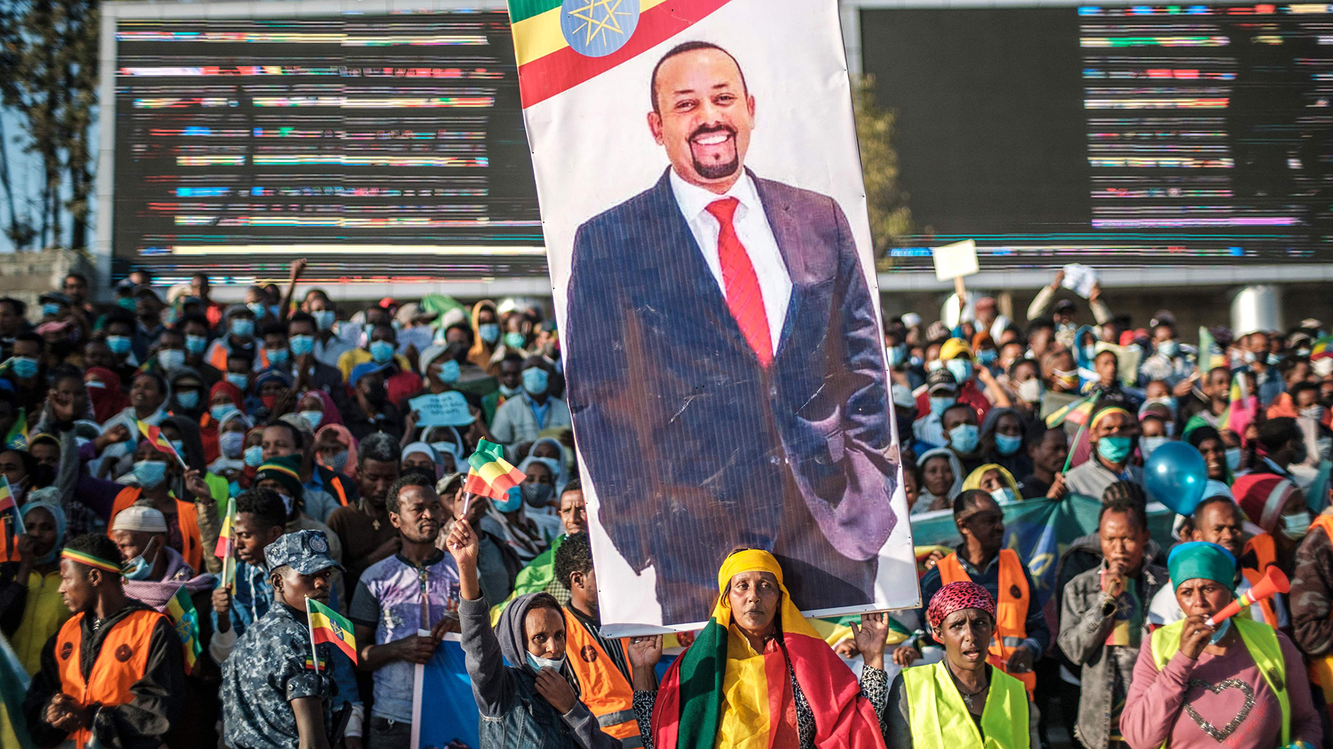 Demonstranten mit einem Banner, auf dem Äthiopiens Ministerpräsident Abiy Ahmedzu sehen ist. | AFP