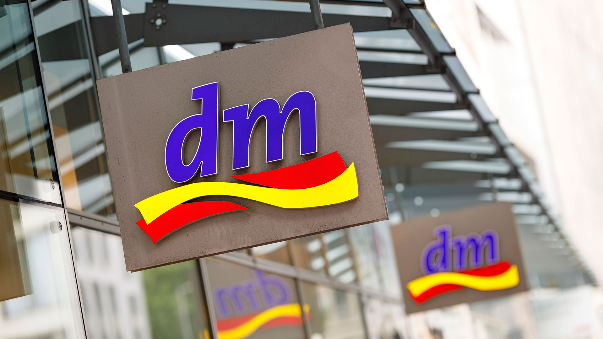 DM-Logo | picture alliance / Geisler-Fotop