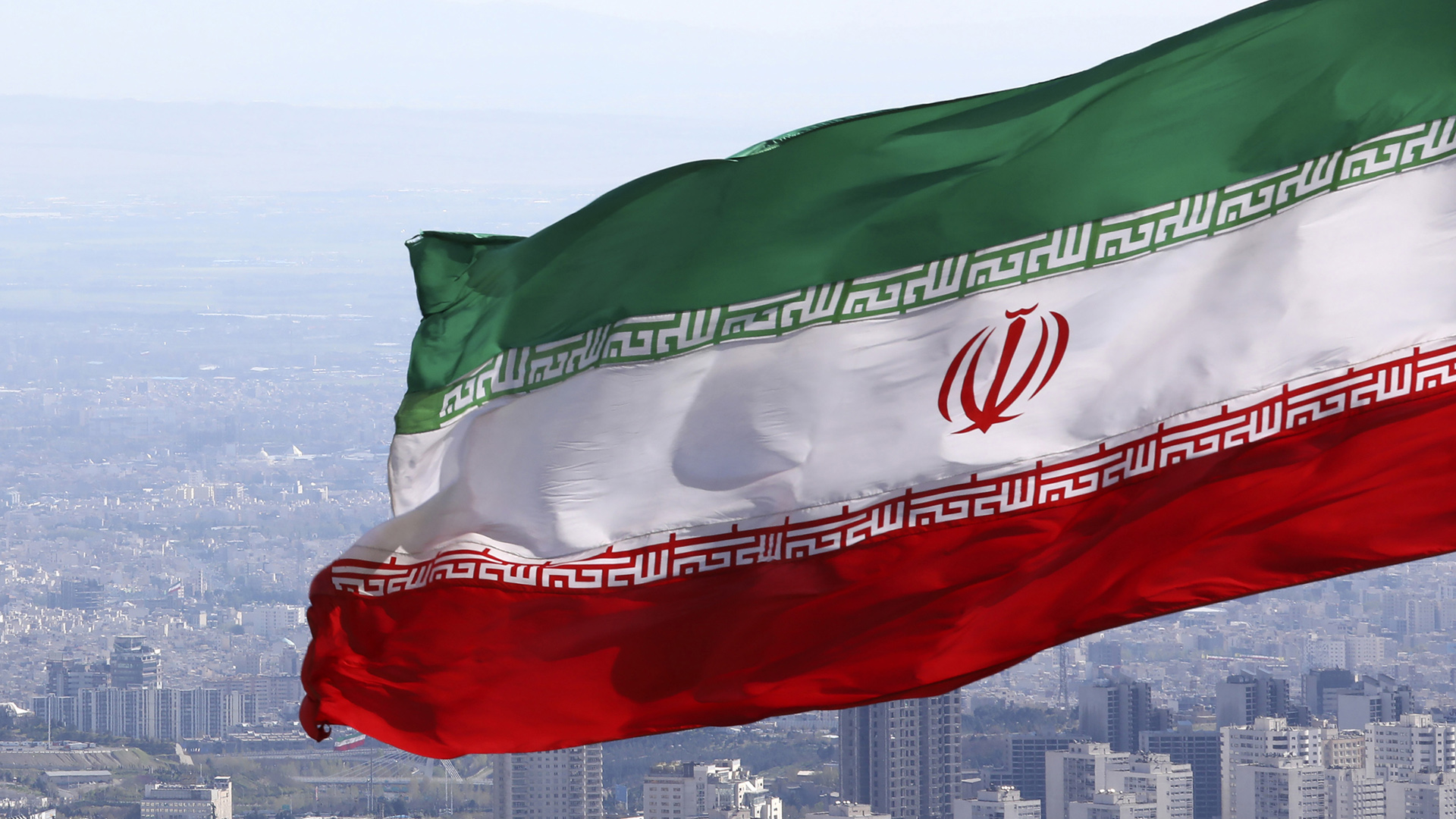 Iranische Flagge im Hintergrund Teheran