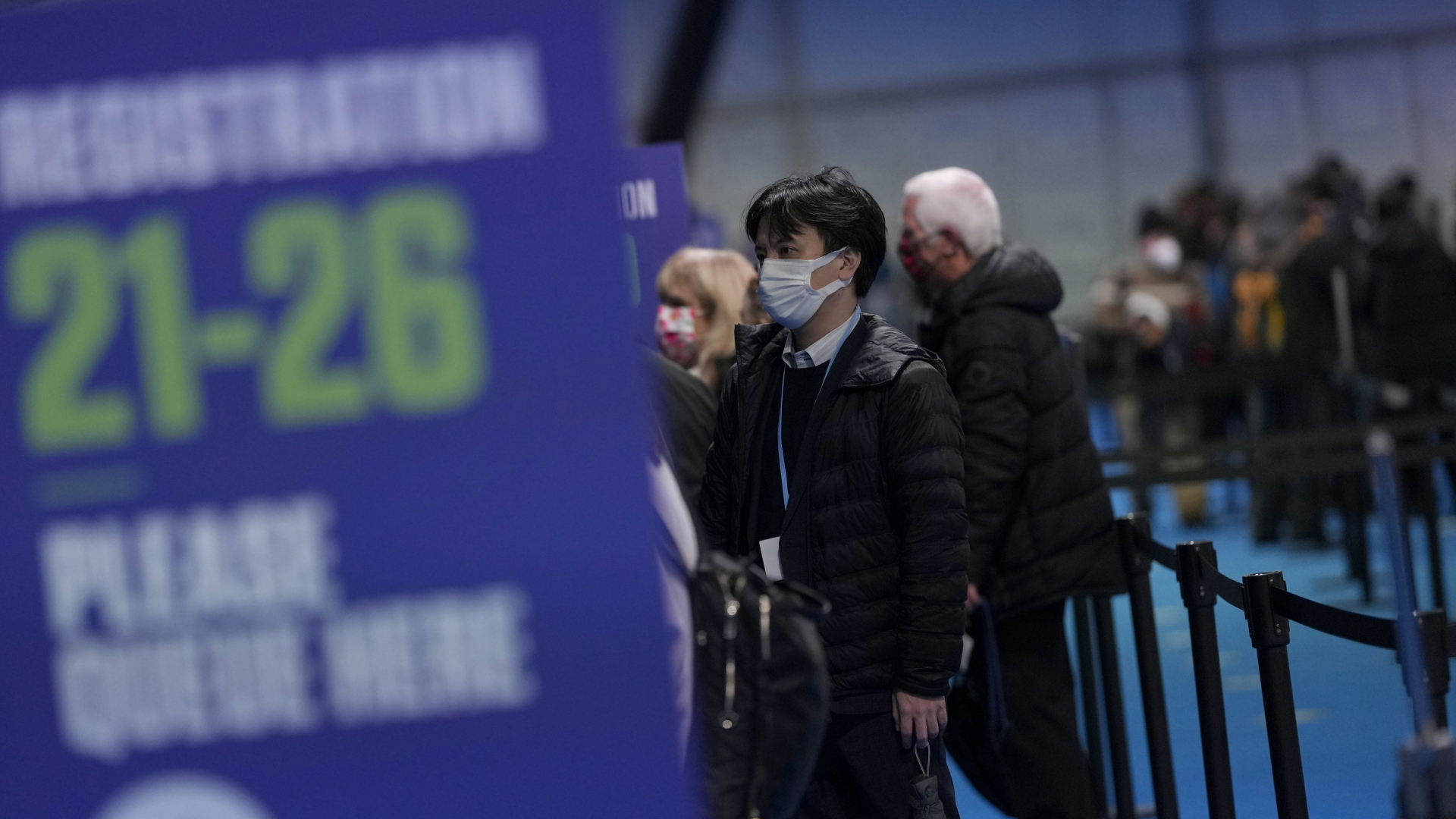 Teilnehmer der UN-Klimakonferenz COP26 in Glasgow bei der Registrierung | AP
