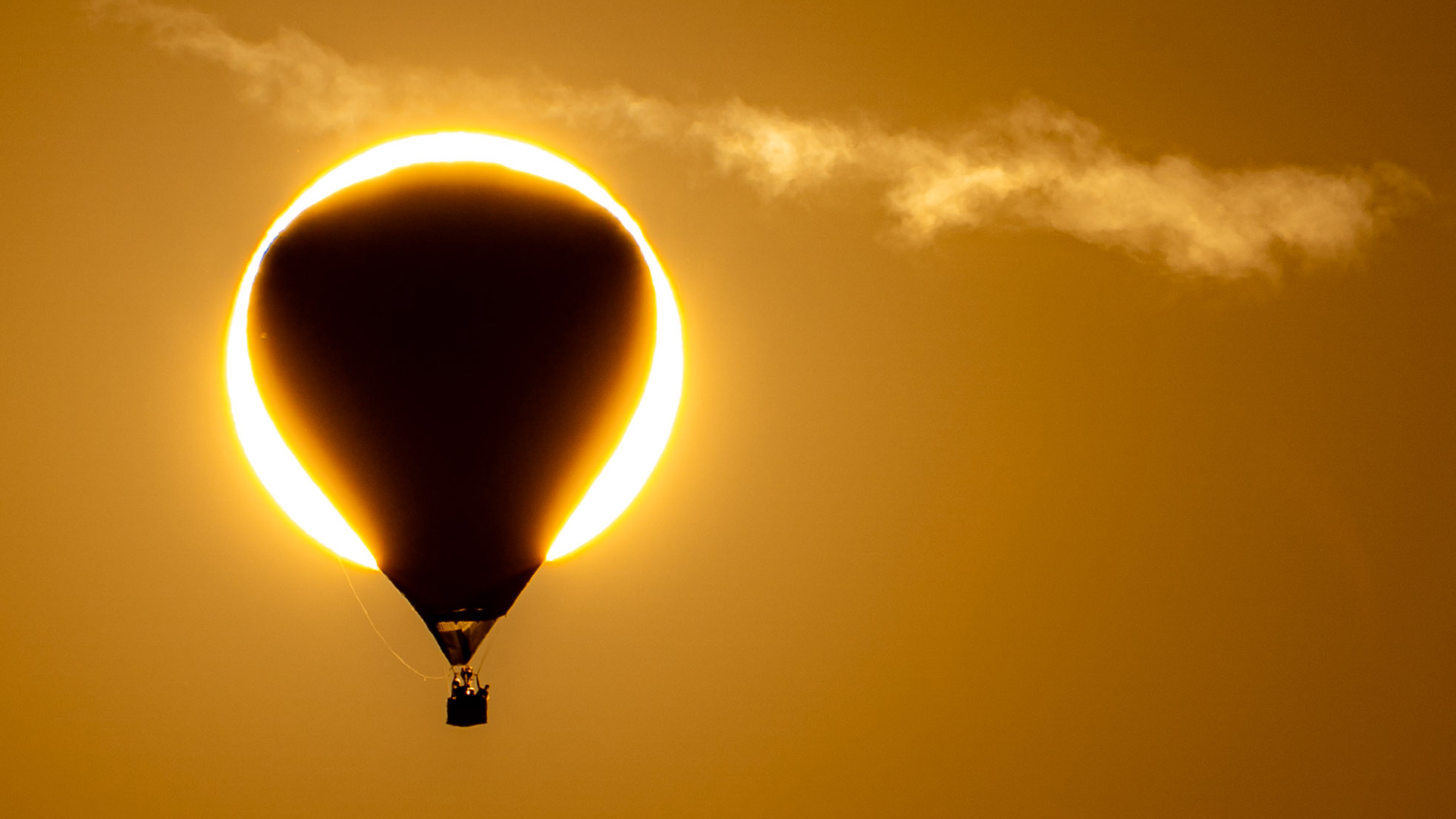 balloon in front of the sun