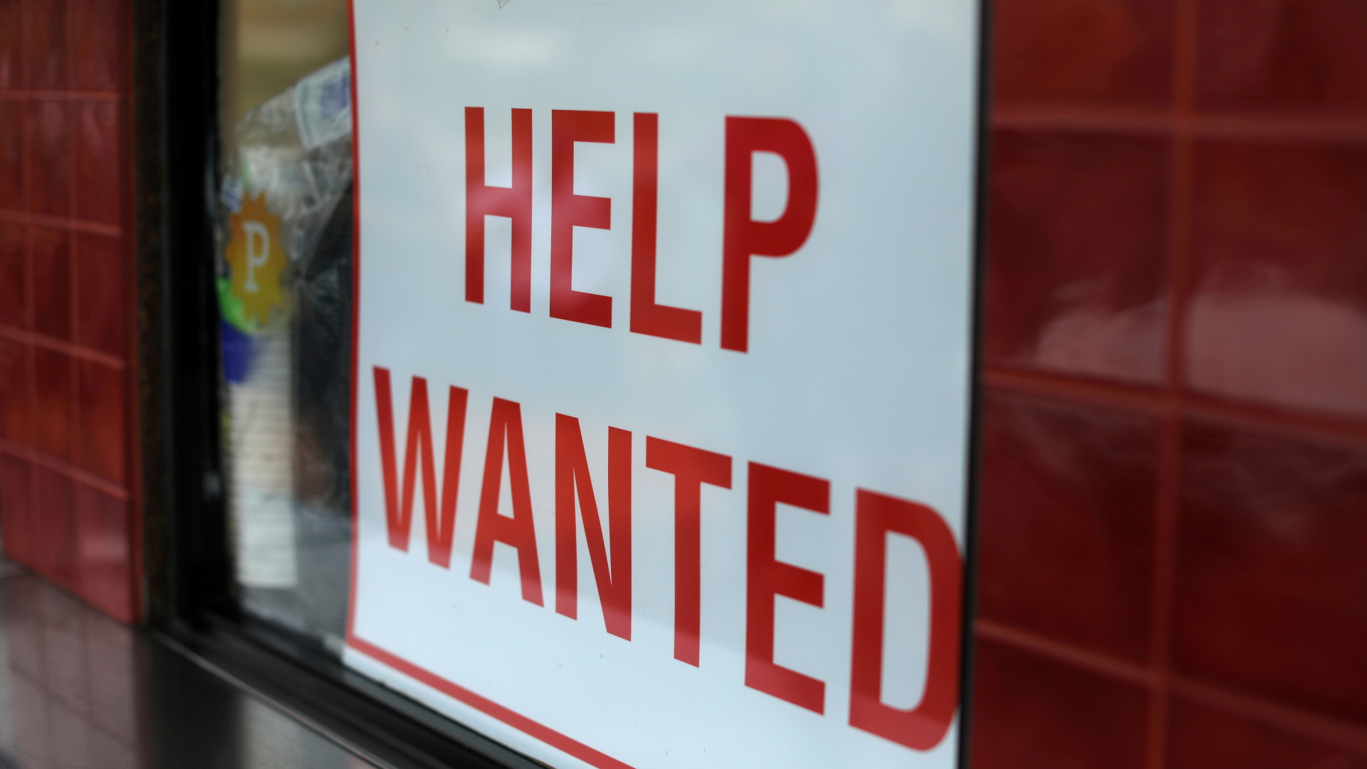Schild mit der Aufschrift "Help Wanted" | REUTERS