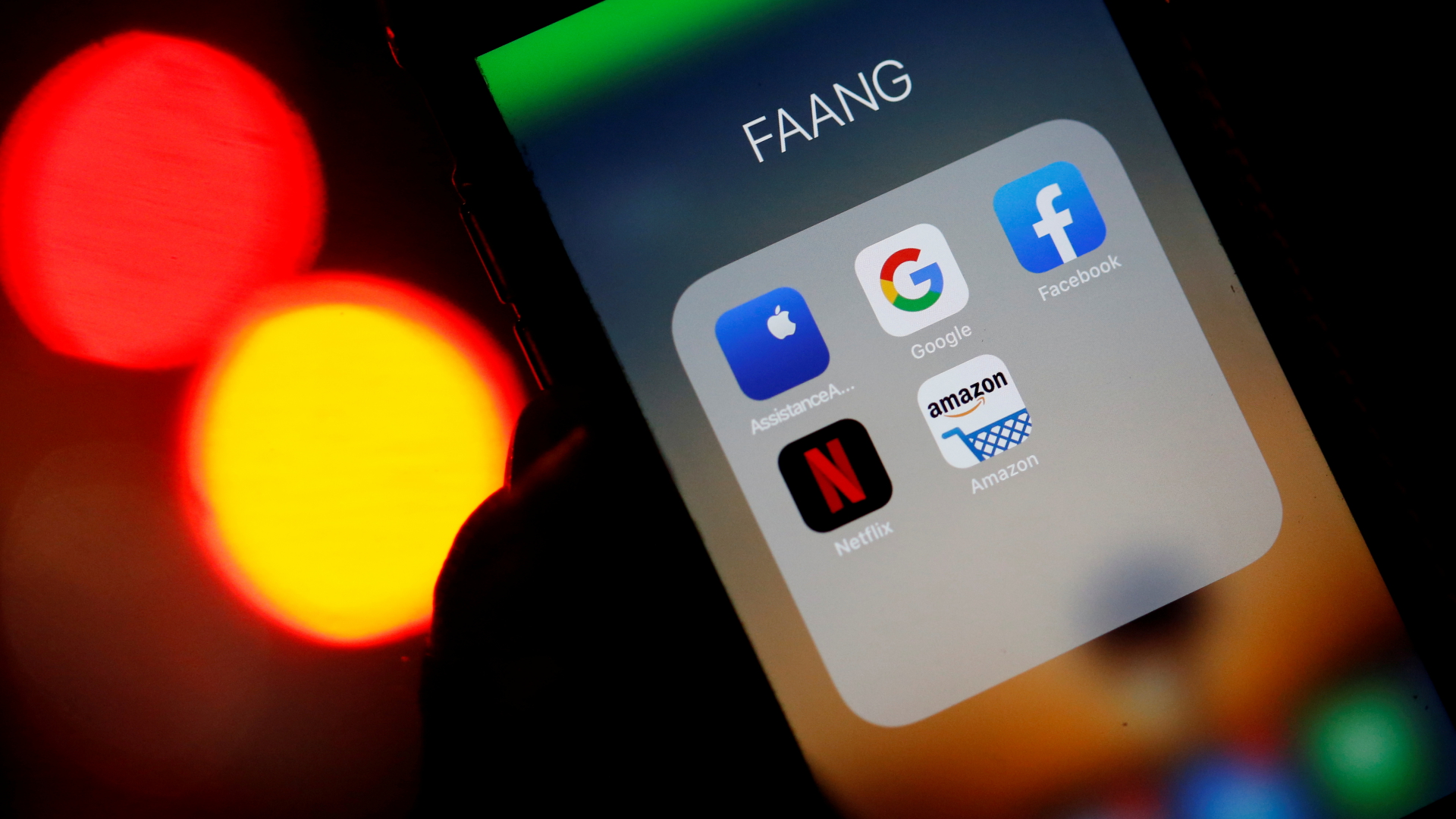 The icons of several apps such as Google, Amazon or Facebook can be seen on a mobile phone. | REUTERS