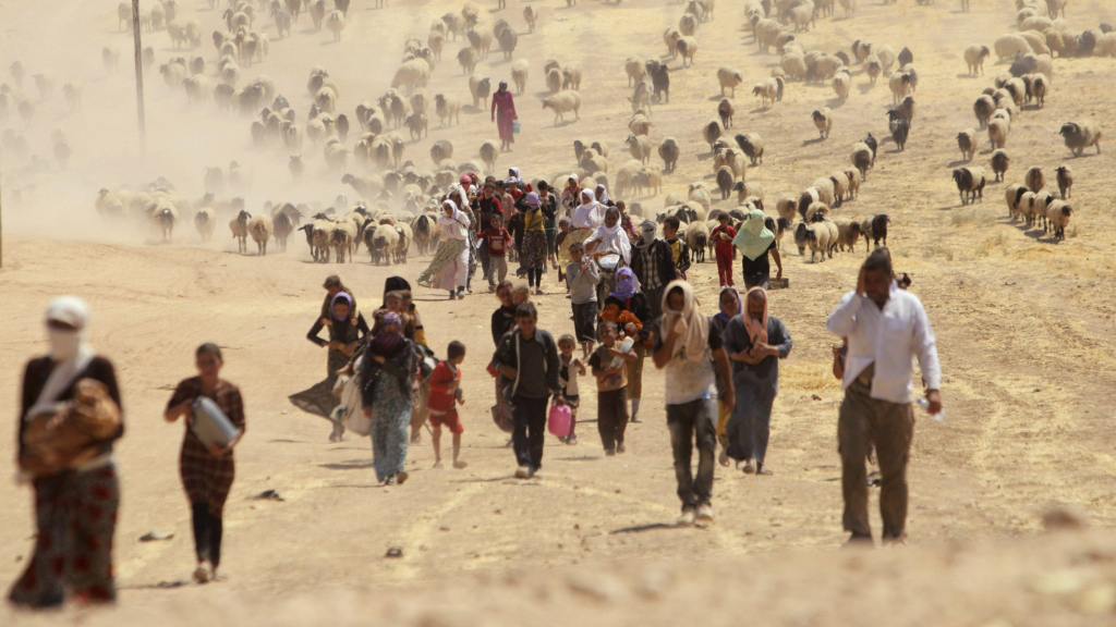 Flüchtende Jesiden an der Grenze des Irak zu Syrien | REUTERS
