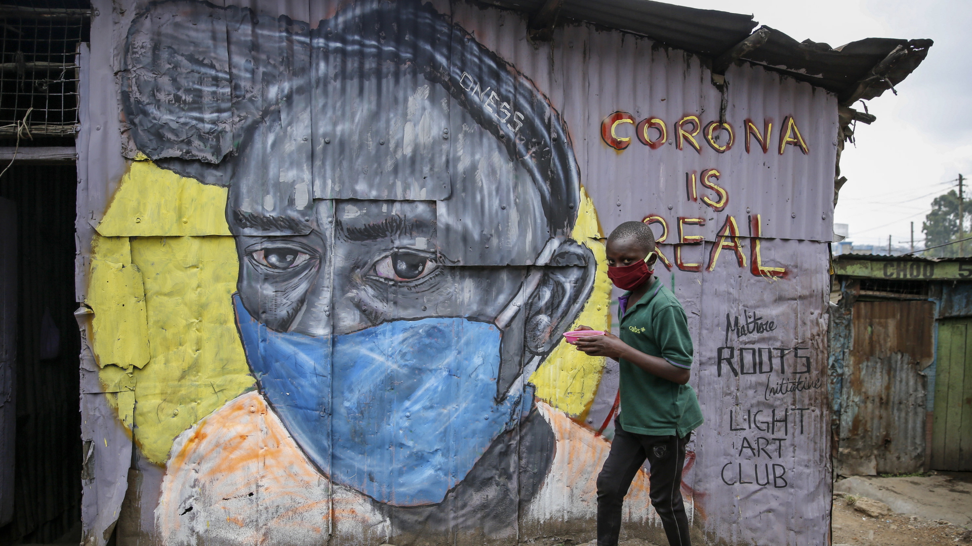Ein Graffiti-Wandgemälde in Nairobi warnt Menschen vor der Gefahr des Coronavirus. | AP