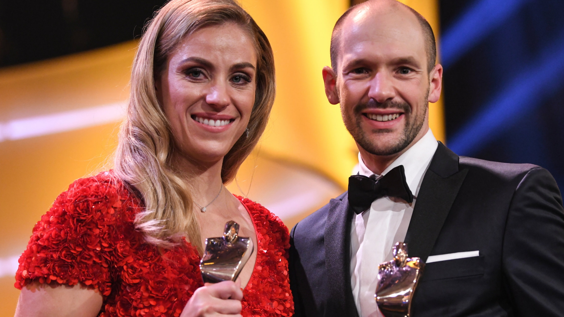 "Sportler des Jahres: Tennisspielerin Angelique Kerber und Triathlet Patrick Lange freuen sich über die Auszeichnung. | Bildquelle: dpa