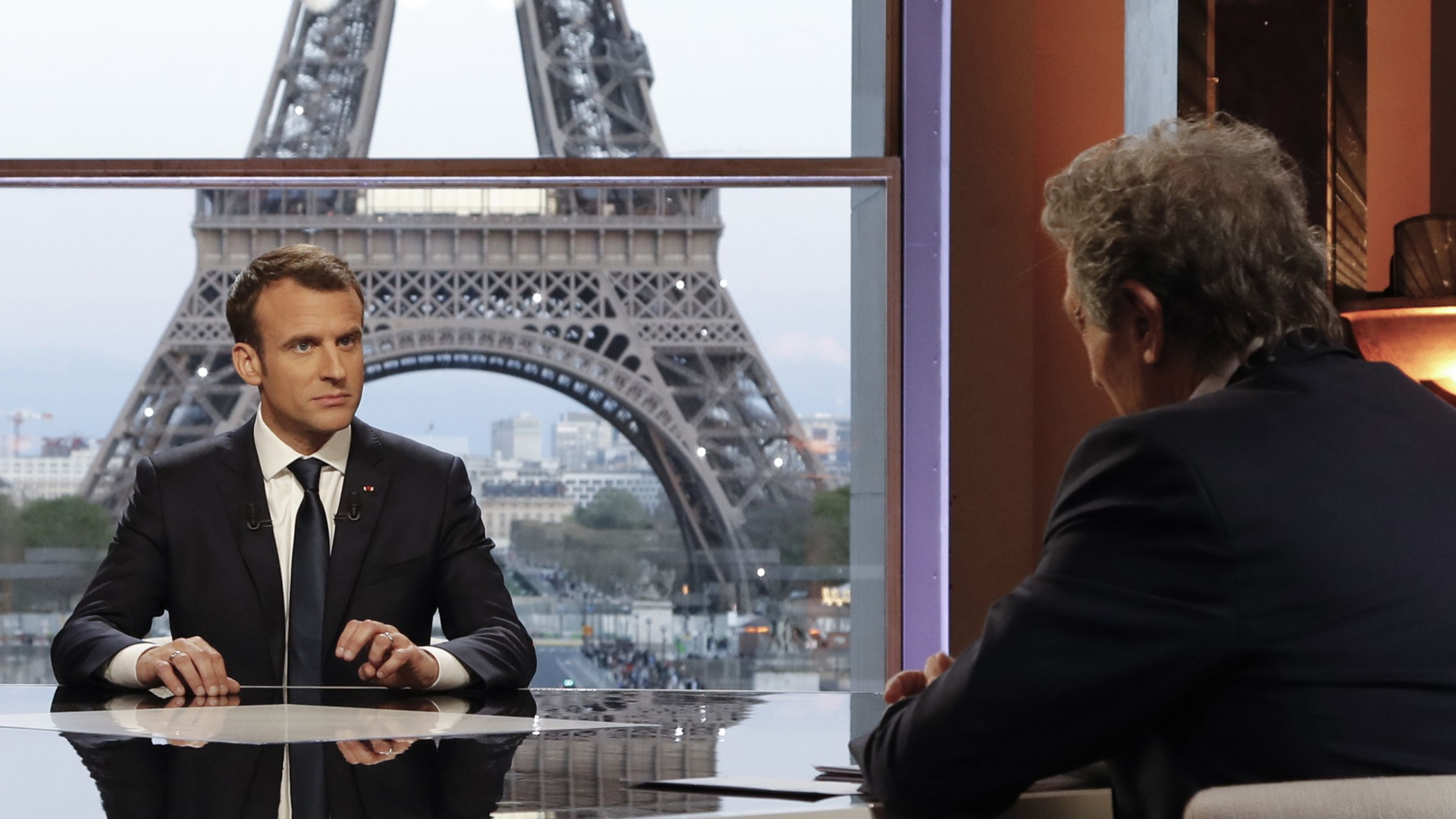 Der französische Präsident Macron im Fernsehinterview | AFP