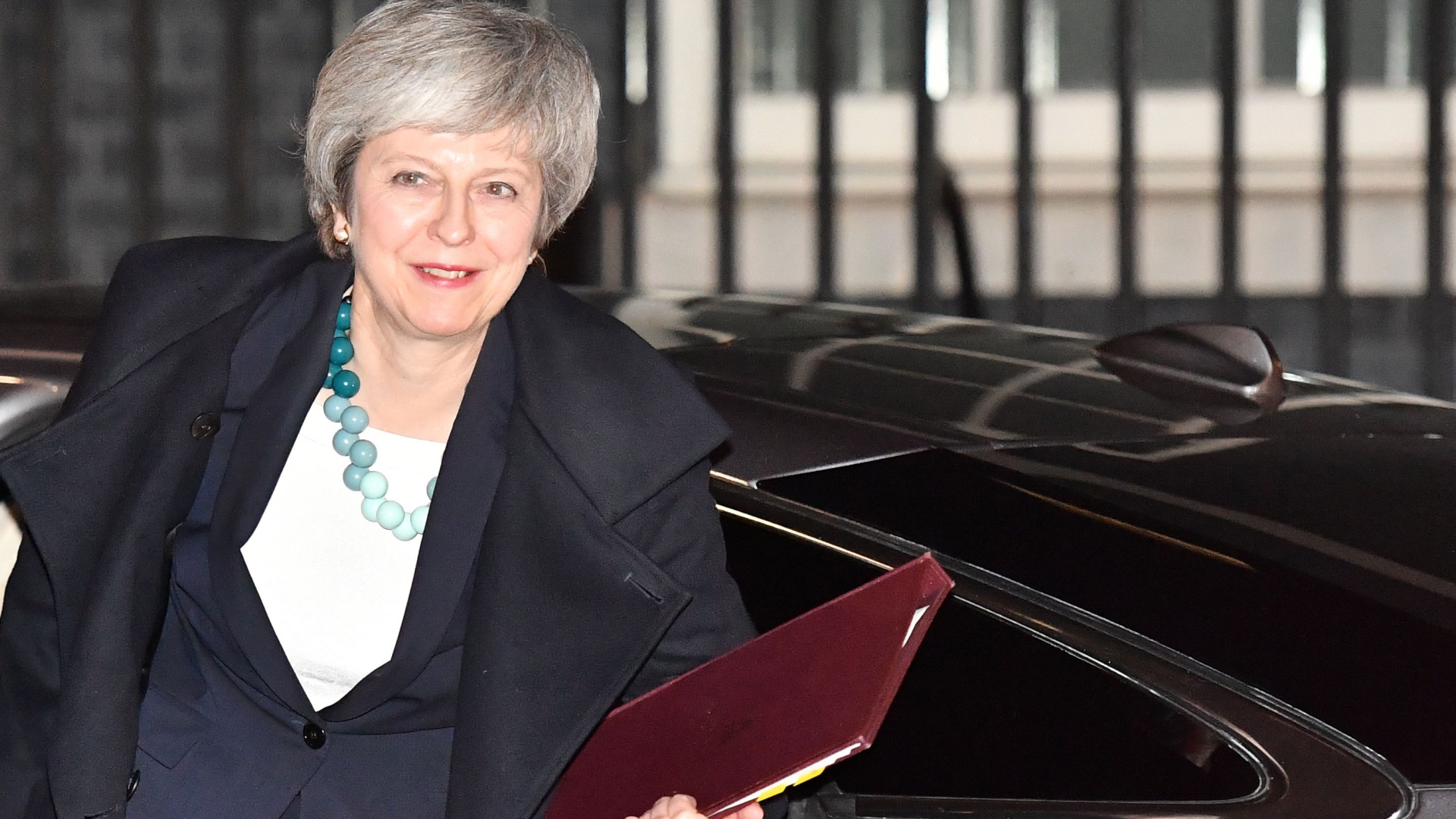 Theresa May nach der Verschiebung der Brexit-Abstimmung | AFP