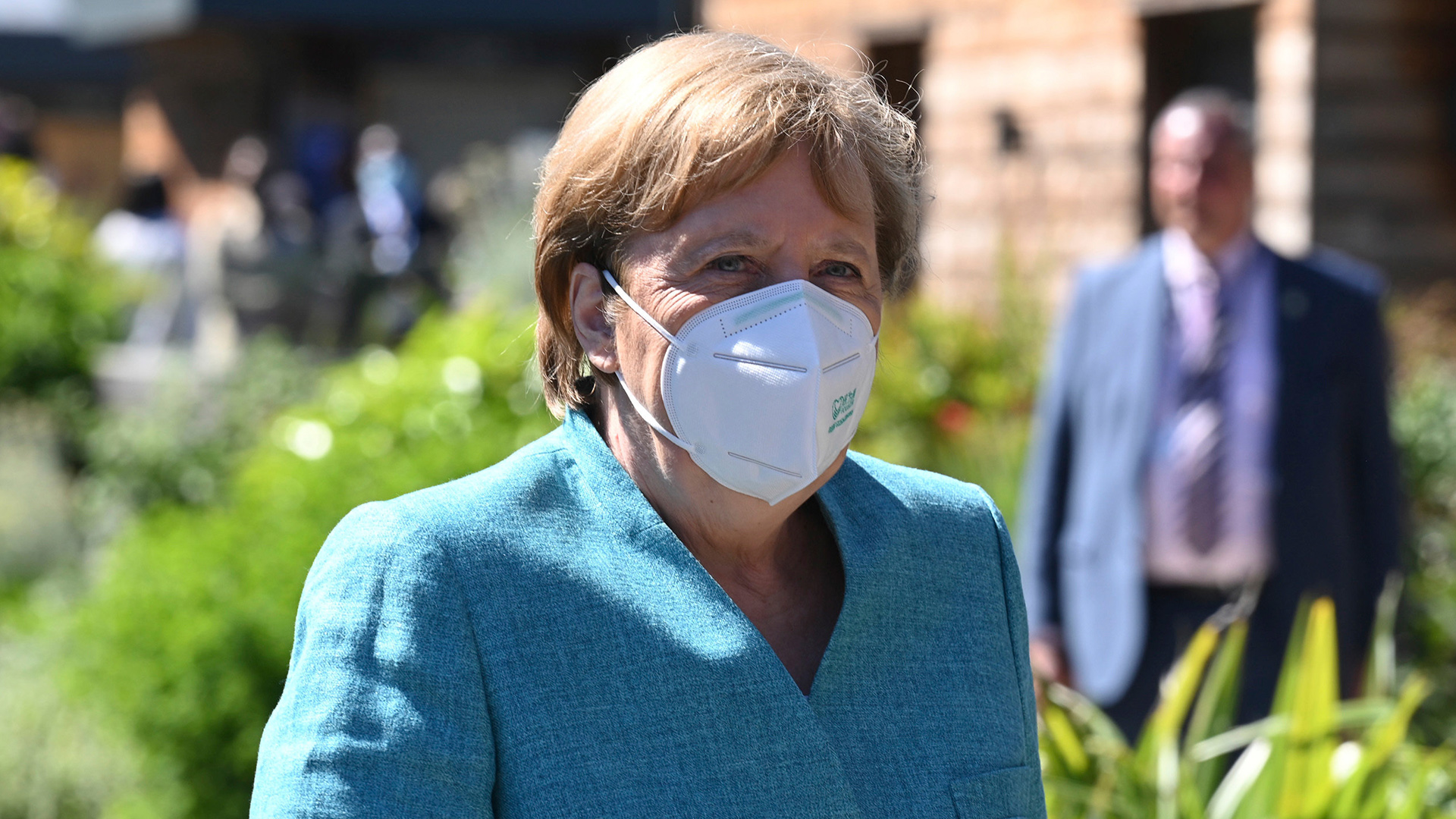 Angela Merkel mit FFP2-Maske | AP