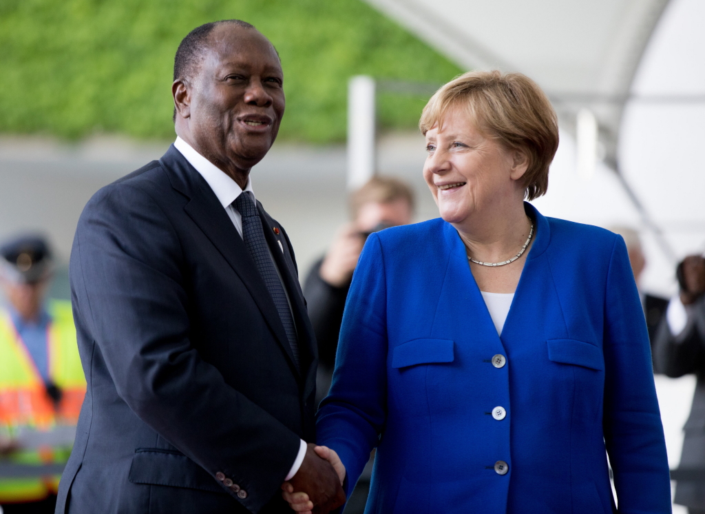 Merkel und der Präsident der Elfenbeinküste, Ouattara | dpa