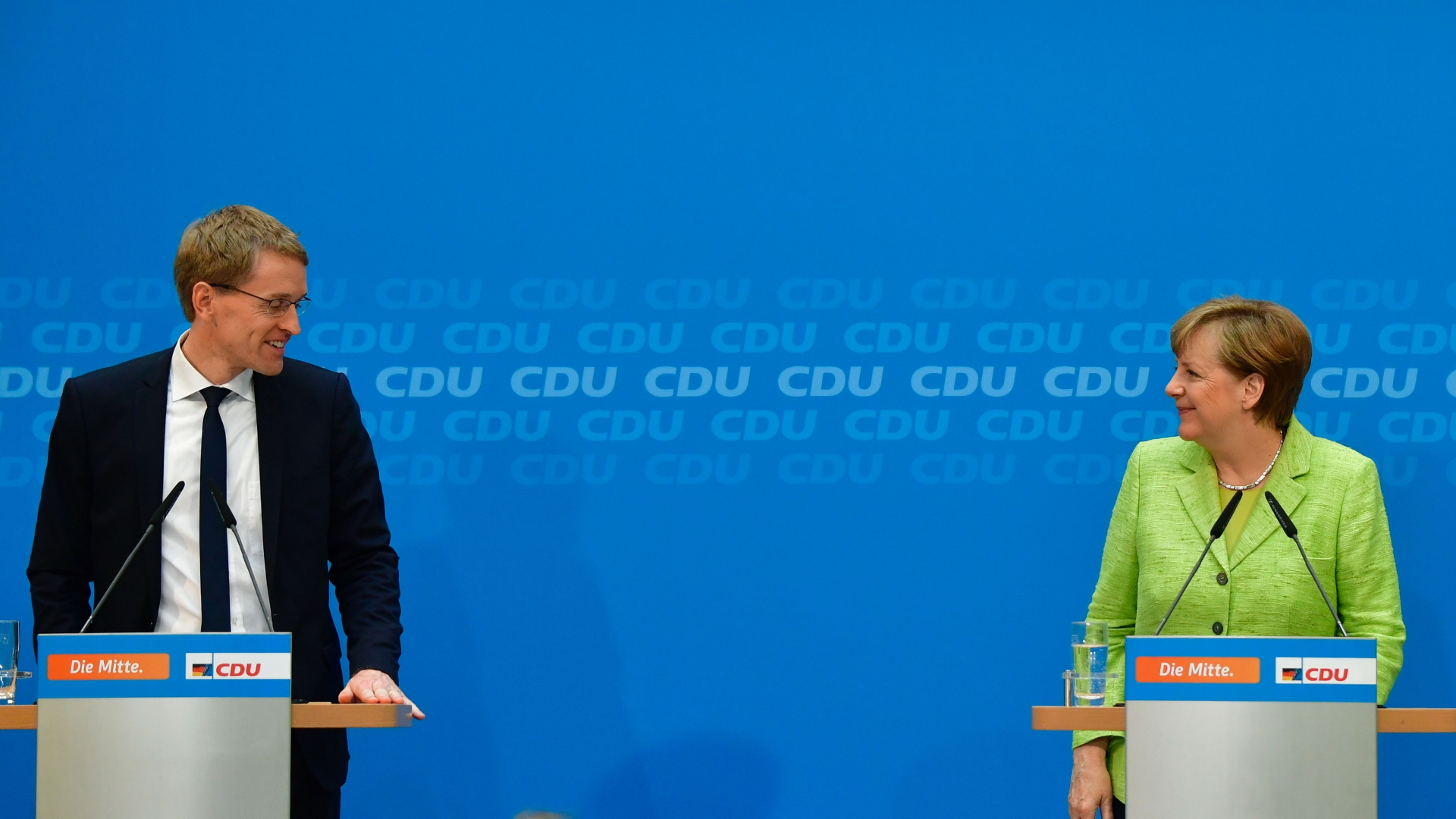Günther und Merkel bei der CDU-PK | AFP