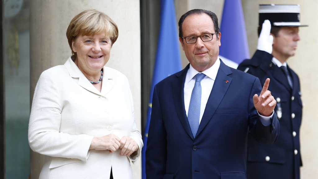 Angela Merkel und Francois Hollande | AP