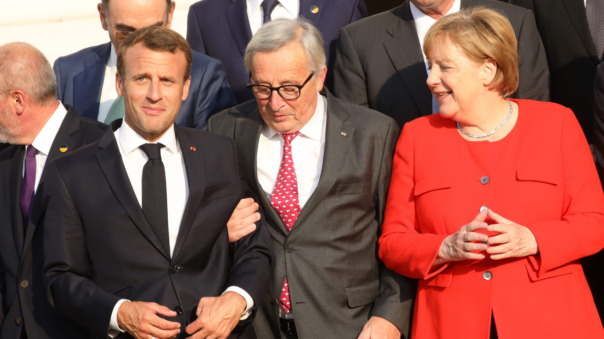 Macron, Juncker und Merkel in Meseberg