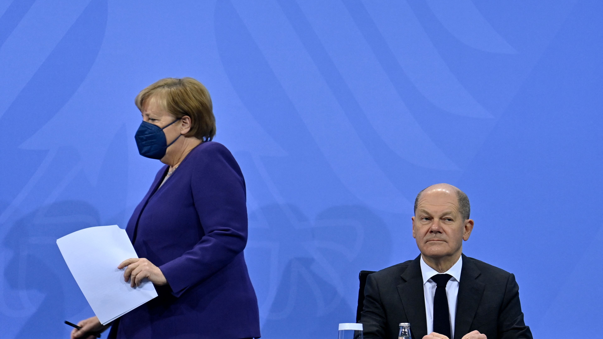Angela Merkel und Olaf Scholz | AFP