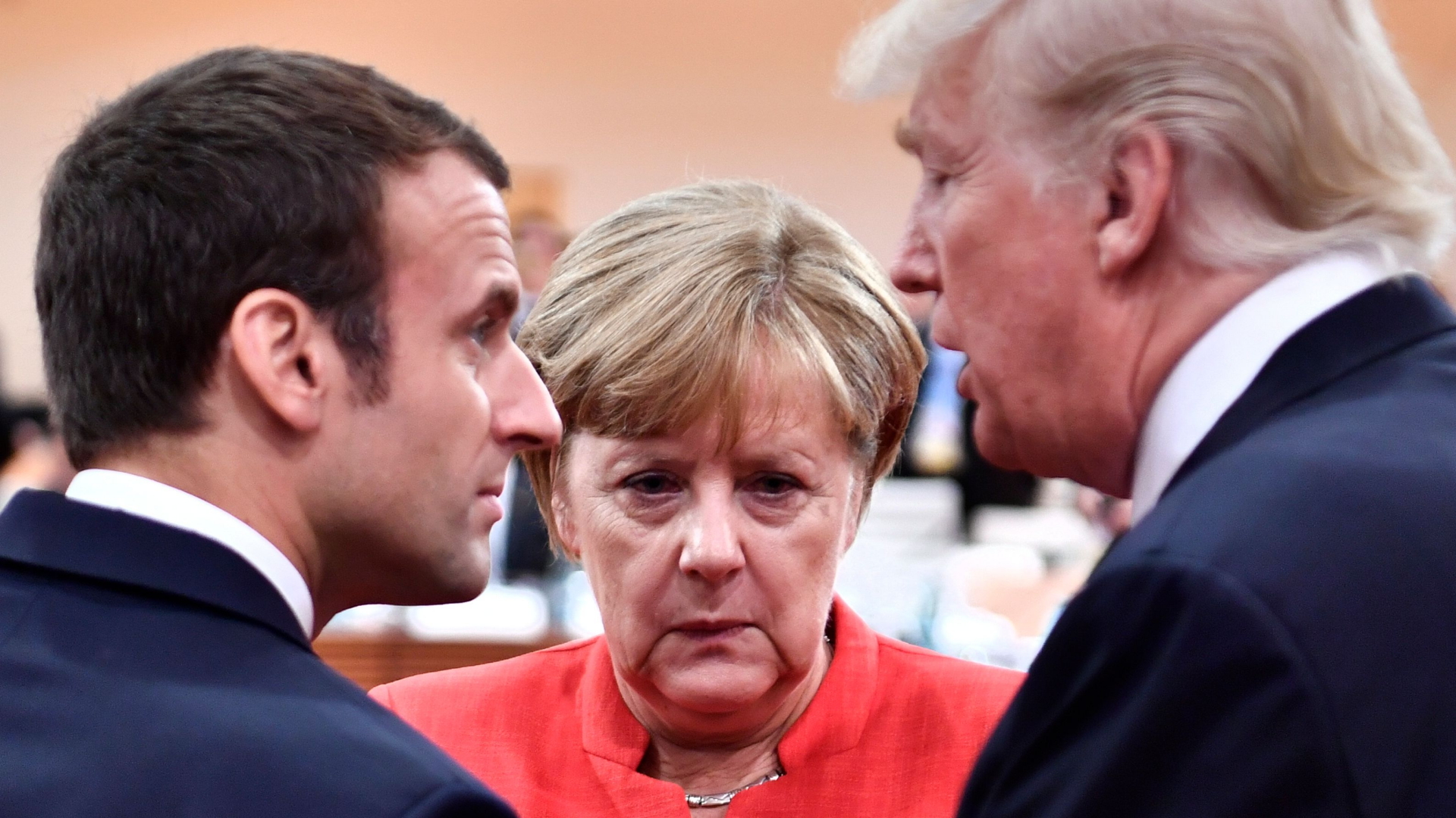 Macron, Merkel und Trump