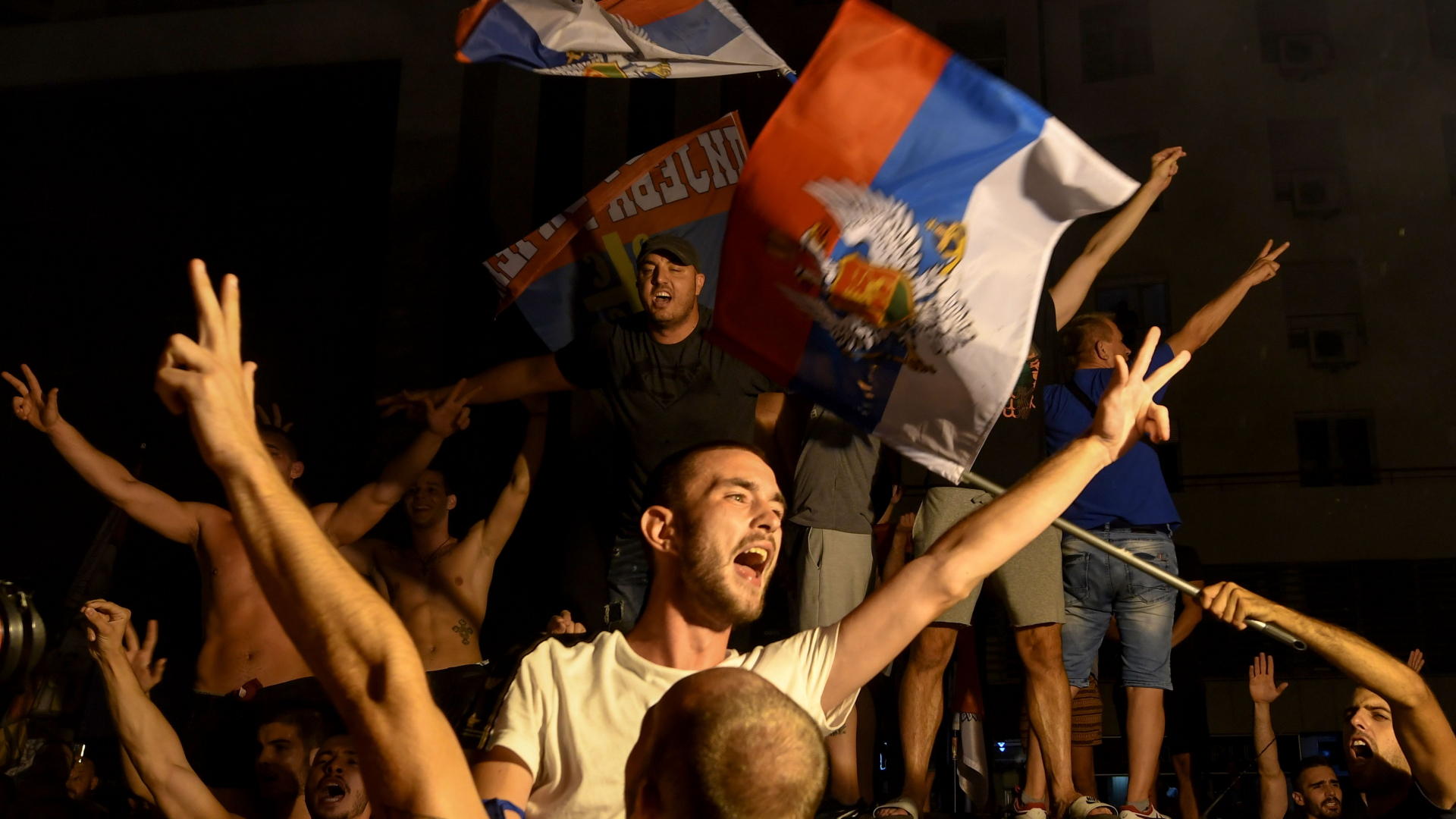 Anhänger der Opposition feiern das Ergebnis der Parlamentswahl in Montenegro | AFP