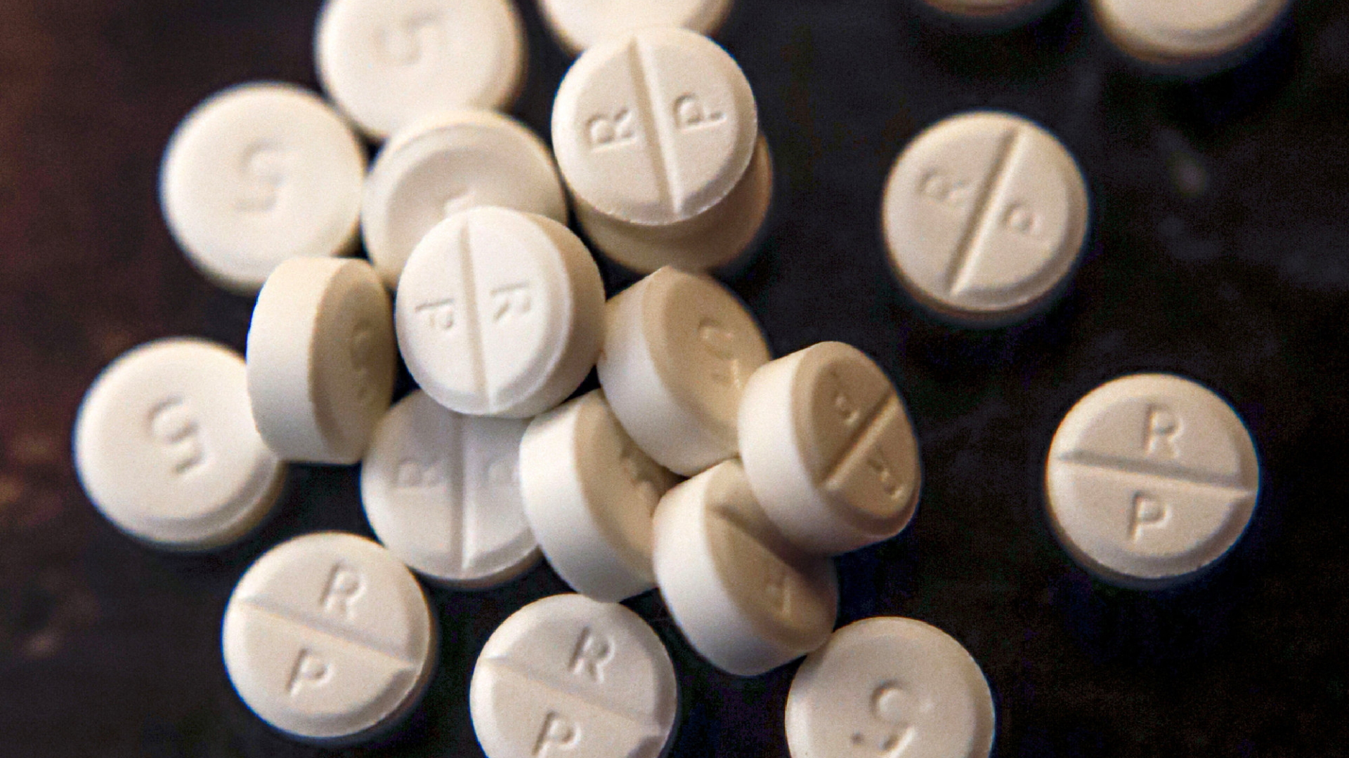 Eine Handvoll 5 Milligramm Schmerzmittel-Tabletten. | AP
