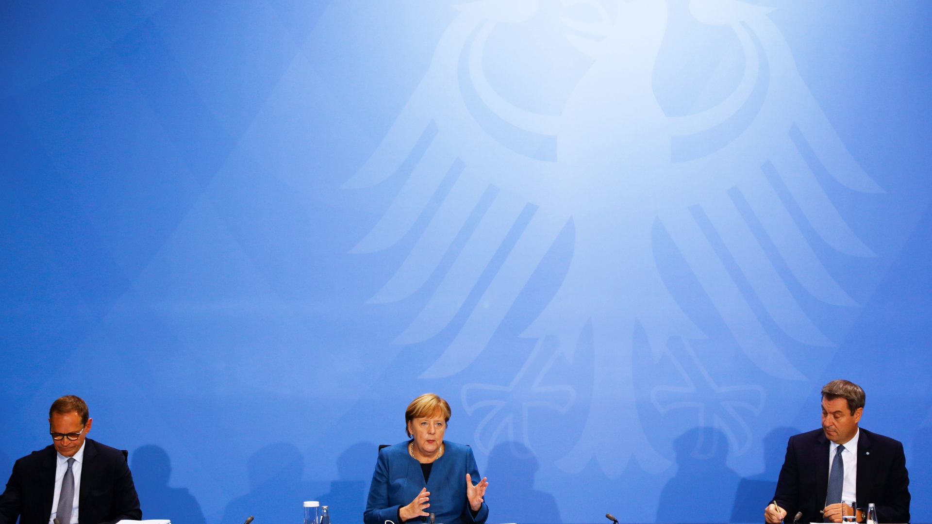 Pressekonferenz Müller, Merkel und Söder | AFP