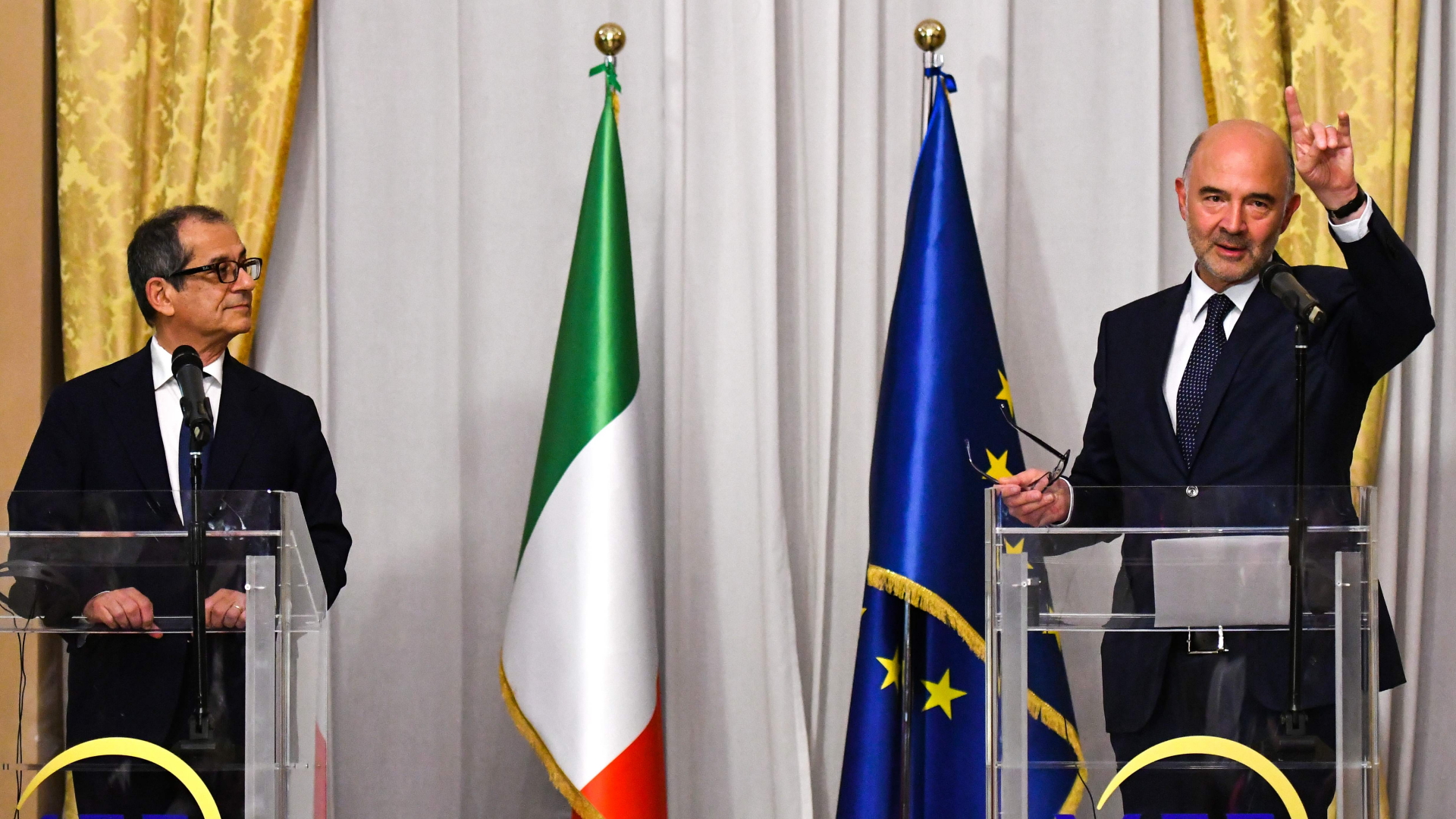 Wirtschaftsminister Tria und EU-Kommissar Moscovici | AFP