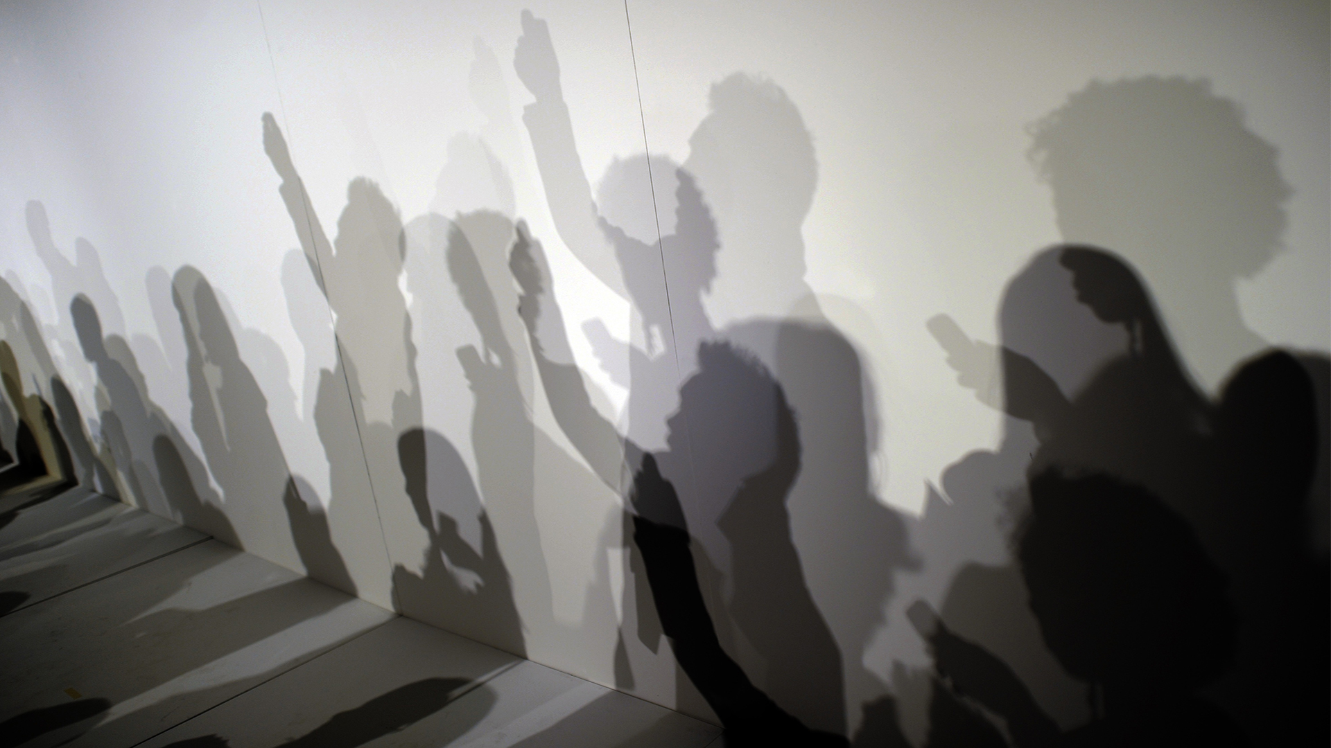 Schatten an einer Wand | picture alliance / AFP Creative