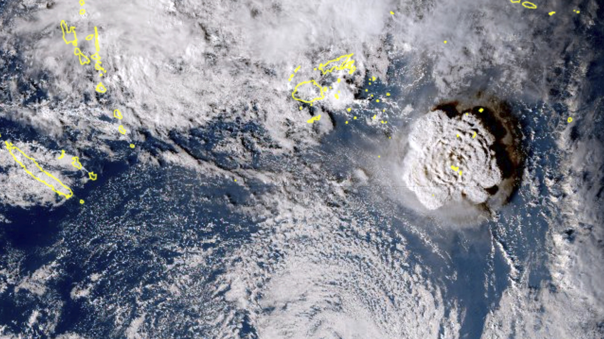 Auf einem Satellitenbild ist rechts der Vulkanausbruch in Tonga zu sehen. | AP