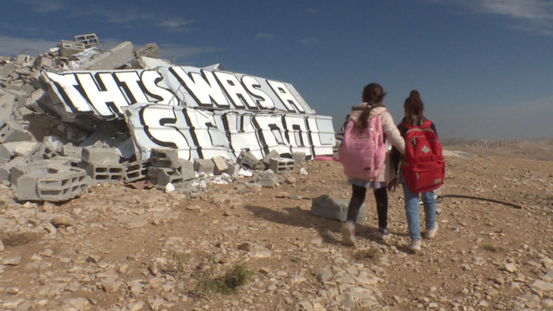Graffitti auf einer von der israelischen Armee zerstörten Schule im Westjordanland | S.v.d.Tann
