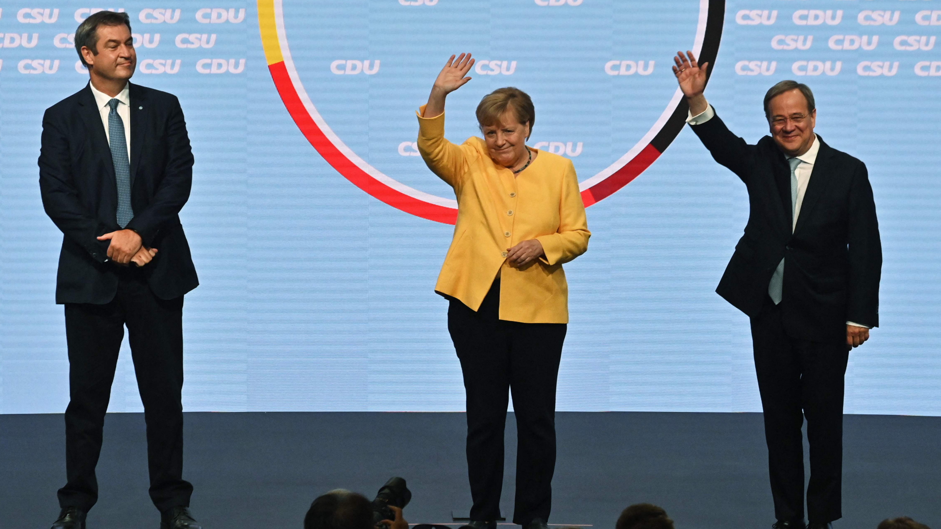 Markus Söder, Angela Merkel und Armin Laschet | AFP