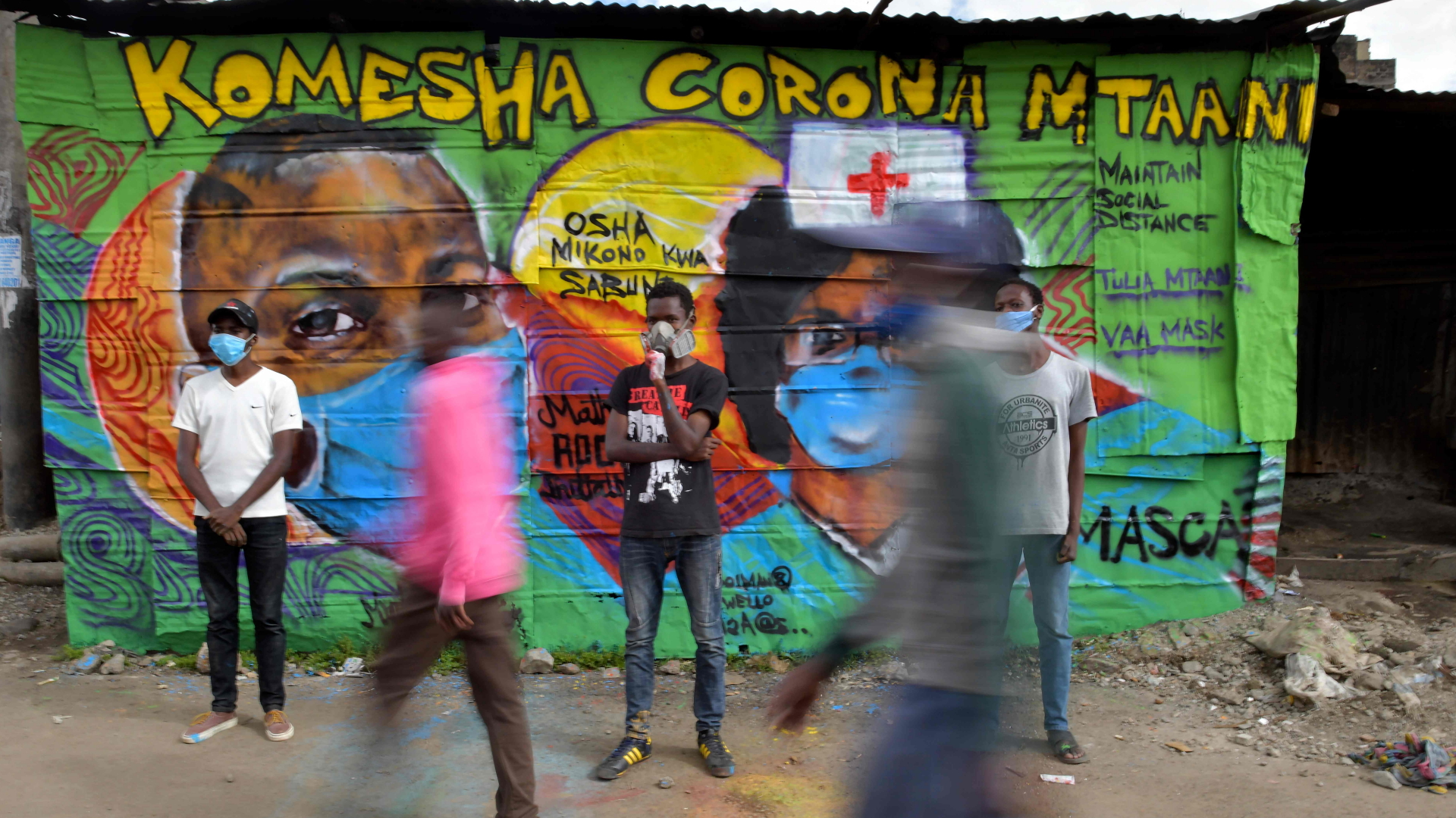 Ein Graffiti informiert in Mathare in Nairobi über das Coronavirus. | AFP
