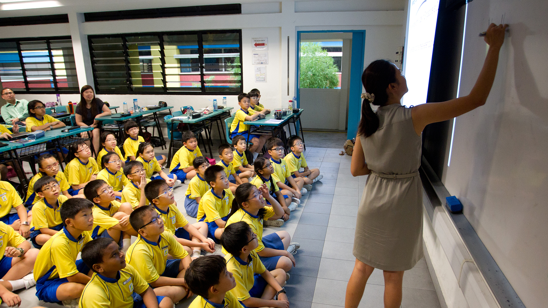 Grundschüler einer Schule in Singapur | picture alliance / AP Images